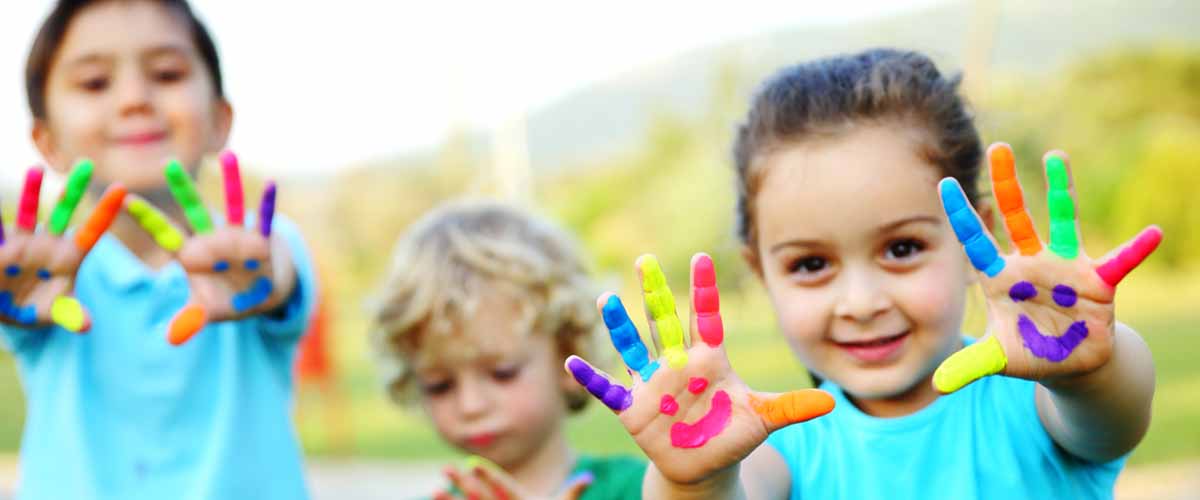 Preschoolers with Painted Hands